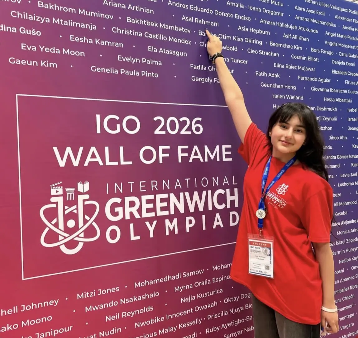 A CST student at the IGO 2026 Wall of Fame